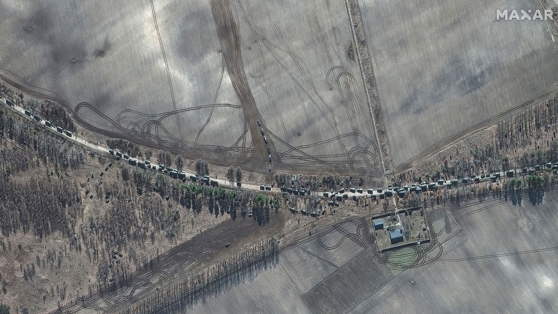 Russian military convoy  reaches outskirts of Kyiv, satellite images show