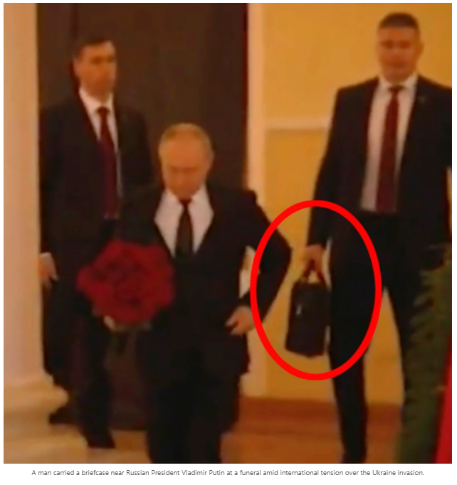 Fears of nuclear war as Putin shows up to funeral with secret nuclear case