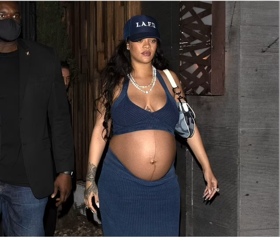 Rihanna shows off her growing BABY BUMP in bra top and skirt after dinner with ASAP Rocky 