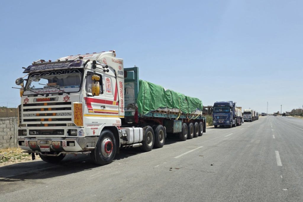 Trucks carrying humanitarian aid bound for Gaza